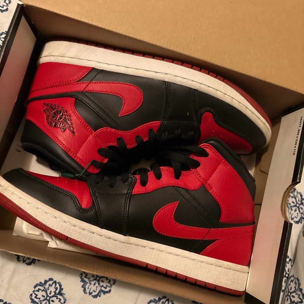 Nike Air Jordan Black and Red High Tops
